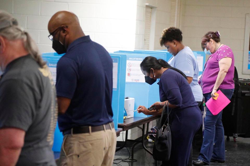 Voters cast their ballots in the 2022 primary May 24 in Garden City, Georgia. Voter turnout in the Georgia primary rose across every demographic, an analysis by the USA TODAY Network found.