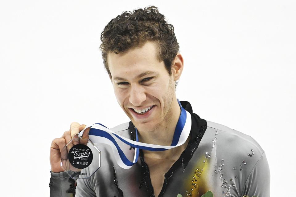 US' Jason Brown celebrates during the medal ceremony of the men's free skating at the Finlandia Trophy Espoo international figure skating competition in Espoo, Finland, on October 8, 2021. - Finland OUT (Photo by Heikki Saukkomaa / Lehtikuva / AFP) / Finland OUT (Photo by HEIKKI SAUKKOMAA/Lehtikuva/AFP via Getty Images)