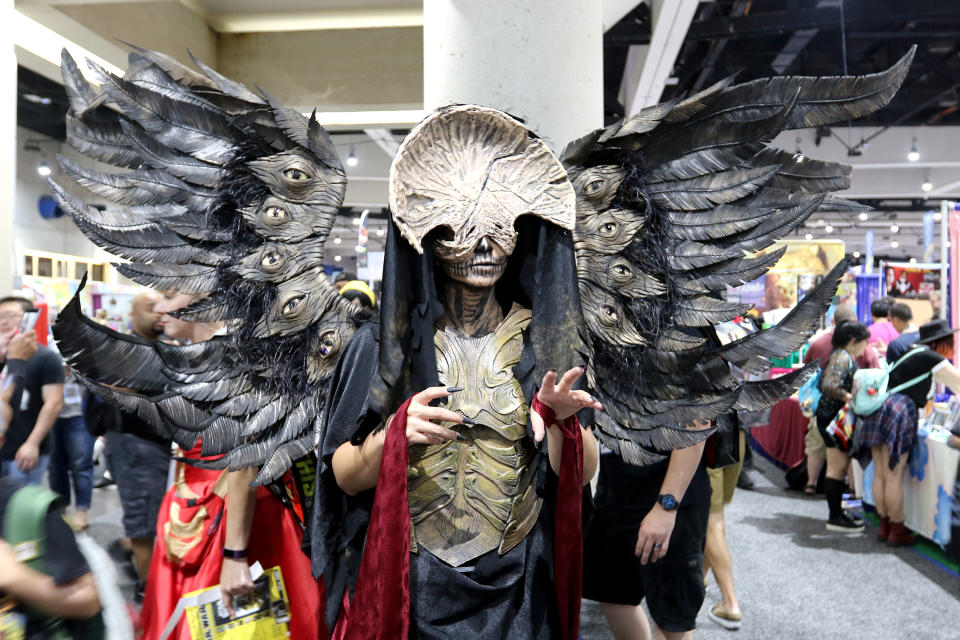 <p>Cosplayer dressed as the Angel of Death from <em>Pan’s Labyrinth</em> at Comic-Con International on July 20 in San Diego. (Photo: Angela Kim/Yahoo Entertainment) </p>