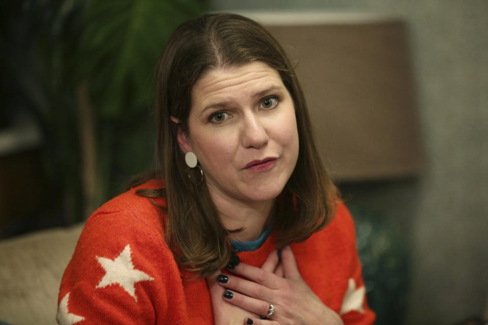 Liberal Democrats Party leader Jo Swinson, reacts during her visit to Manor Grange Care Home for the elderly while on the General Election campaign trail, in Edinburgh, Scotland, Thursday Dec. 5, 2019. Britain's Brexit is one of the main issues for political parties and for voters, as the UK goes to the polls in a General Election on Dec. 12. (David Cheskin/PA via AP)