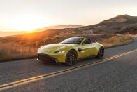 <p>A sports car's primary mission is to make the driver <em>feel </em>behind the wheel, and the beautiful 2022 Aston Martin Vantage does all that while making heads turn everywhere it goes. Its sensual shape­–available with a fixed roof or a retractable soft top­–is classic sport's car stuff, with a long hood and wide haunches. What's under that clamshell hood is almost equally as lusty: a 500-plus-hp twin-turbo V-8 sourced from <a href="https://www.caranddriver.com/mercedes-amg" rel="nofollow noopener" target="_blank" data-ylk="slk:Mercedes-AMG;elm:context_link;itc:0;sec:content-canvas" class="link ">Mercedes-AMG</a>. This vociferous mill mates with a manual or automatic transmission, but unfortunately the former is only offered on the regular coupe. For drivers looking to channel their inner Sebastian Vettel, Aston now offers a track-tuned F1 Edition with distinct styling, an enhanced chassis, and extra horsepower. While the Vantage's interior suffers from some fit-and-finish issues and uncouth wind and road noise at highway speeds, the highly customizable cabin can still be lavishly appointed. Most importantly, <a href="https://www.caranddriver.com/aston-martin" rel="nofollow noopener" target="_blank" data-ylk="slk:Aston Martin's;elm:context_link;itc:0;sec:content-canvas" class="link ">Aston Martin's</a> entry-level machine constantly manufactures smiles and stares.</p><p><a class="link " href="https://www.caranddriver.com/aston-martin/vantage" rel="nofollow noopener" target="_blank" data-ylk="slk:Review, Pricing, and Specs;elm:context_link;itc:0;sec:content-canvas">Review, Pricing, and Specs</a></p>