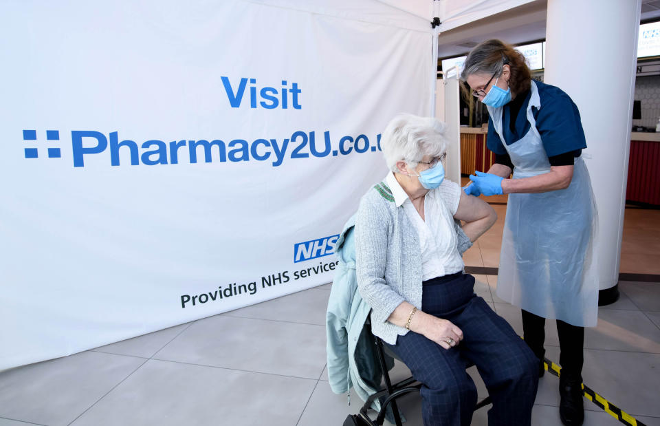 EDITORIAL USE ONLY Christina Watkins, aged 82, from Aylesbury is one of the first people to receive the Oxford/AstraZeneca vaccine at the opening of the first Pharmacy2U Covid-19 vaccination centre at the Odeon Cinema in Aylesbury.