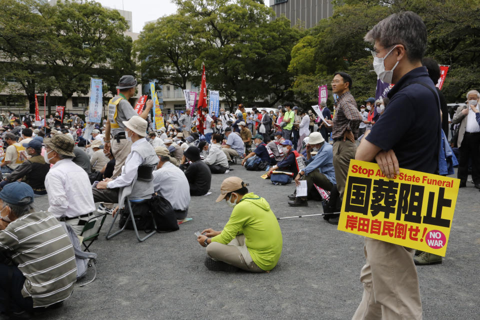 Protesters gather a park in Tokyo Friday, Sept. 23, 2022, demanding the cancellation of former Japanese Prime Minister Shinzo Abe’s state funeral. (AP Photo/Yuri Kageyama)