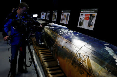 A missile that the U.S. Department of Defense says is a "Qiam" ballistic missile manufactured in Iran and that the Pentagon says was fired by Houthi rebels from Yemen into Saudi Arabia on July 22, 2017 is seen on display at a U.S. military base in Washington, U.S. December 13, 2017. REUTERS/Jim Bourg