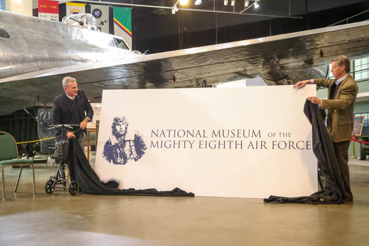 Congressman Buddy Carter and President and CEO Scott Loehr,unveil a sign during a special announcement on Monday, January 8, 2024 at the National Museum of the Mighty Eighth Air Force.