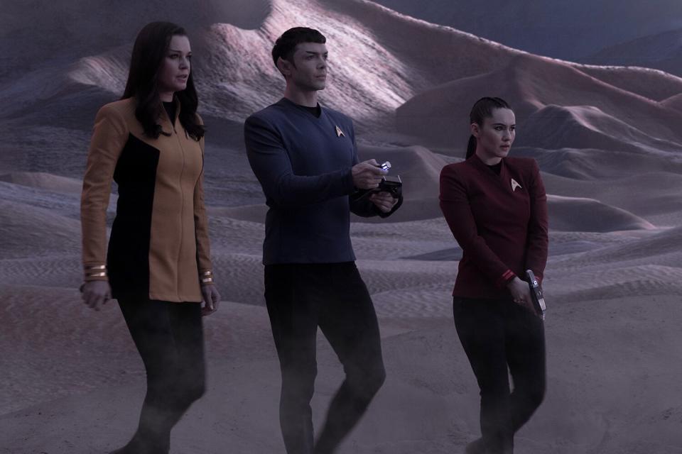 Rebecca Romijn as Una, Ethan Peck as Spock and Christina Chong as La'an appearing in Star Trek: Strange New Worlds, streaming on Paramount+