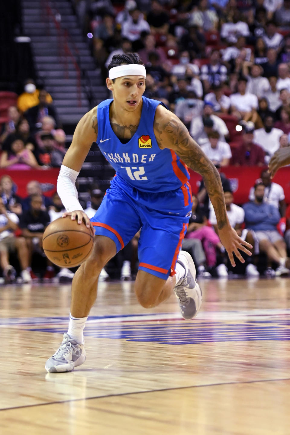 Oklahoma City Thunder's Lindy Waters III brings the ball up against the Houston Rockets during the second half of an NBA summer league basketball game Saturday, July 9, 2022, in Las Vegas. (AP Photo/David Becker)