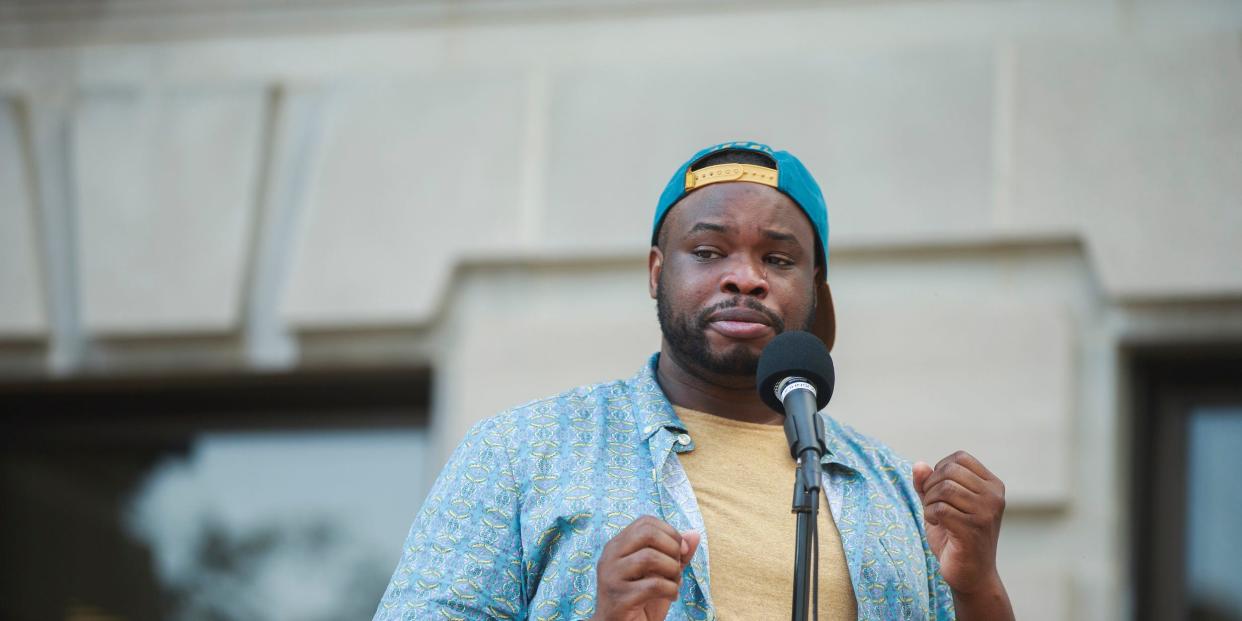 Vauhxx Booker speaks during a community gathering to fight against racism on July 6.