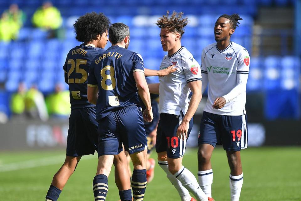 Dion Charles and Paris Maghoma get heated in Saturday's 2-0 win against Port Vale <i>(Image: Camerasport)</i>