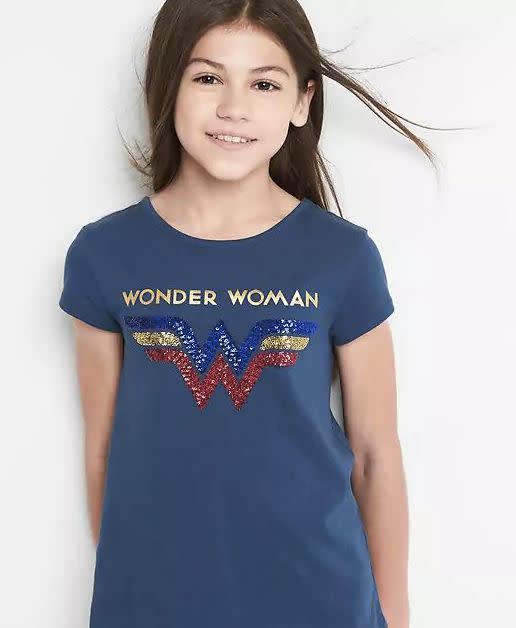 $24, <a href="http://www.gap.com/browse/product.do?pid=733292012&amp;vid=1&amp;locale=en_US&amp;kwid=1&amp;sem=false&amp;sdkw=gapkids-124-wonder-woman-strap-back-tee-P733292&amp;sdReferer=http%3A%2F%2Fwww.gap.com%2Fproducts%2Fgap-x-wonder-woman-collection-C1072174.jsp" target="_blank">here</a>