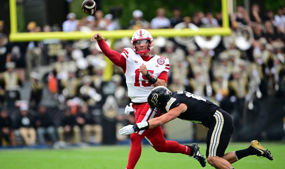 Sep 28, 2024; West Lafayette, Indiana, USA; Purdue Boilermakers linebacker Yanni Karlaftis (14) pressures Nebraska Cornhuskers quarterback Dylan Raiola (15) during the first quarter at Ross-Ade Stadium.