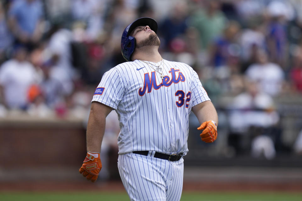 New York Mets' Daniel Vogelbach reacts after striking out during the ninth inning of a baseball game against the St. Louis Cardinals at Citi Field, Sunday, June 18, 2023, in New York. The Cardinals defeated the Mets 8-7. (AP Photo/Seth Wenig)