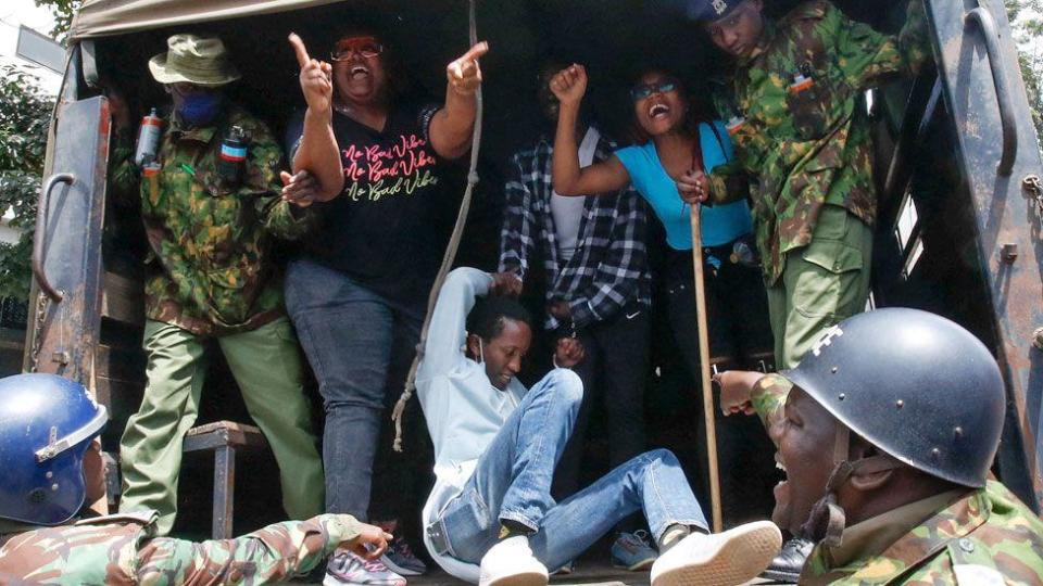 Protesters in a police vehicle in Nairobi, Kenya - 18 June 2024