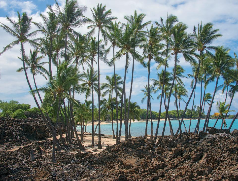 Ala Kahakai National Historic Trail is a 175-mile corridor that takes travelers through lava fields, past beaches (such as Mahai‘ula Bay, seen here) and up mountains.