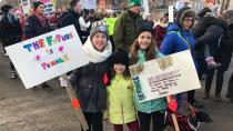 'The future is female': Regina girls march in solidarity with women around the world