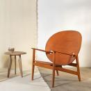 <p>The Nottingham-based designer has collaborated with Benchmark on his first consumer collection. Adapted from his ‘Iklwa’ chair, which won the 2018 Cræftiga Award at The London Design Fair, the range of the same name comprises two lounge chairs and a side table. The chairs’ Afrofuturistic shapes are intended to empower the sitter and unite Collins’ African-Caribbean roots with British craft. As with all Benchmark's pieces, sustainability is embedded throughout, from the British-sourced timber and UK manufacture to non-toxic oils and finishes. Large chair, from £2,275; side table, from £835 <a href="https://benchmarkfurniture.com/" rel="nofollow noopener" target="_blank" data-ylk="slk:benchmarkfurniture.com;elm:context_link;itc:0;sec:content-canvas" class="link ">benchmarkfurniture.com</a></p>