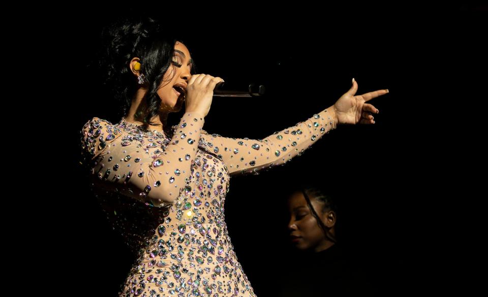 Ypsilanti-born, Detroit-raised artist Queen Naija performs at the Little Caesars Arena in Detroit on Saturday, September 24, 2022. Queen Naija was the opening act performing before British singer Ella Mai and Mary J. Blige.