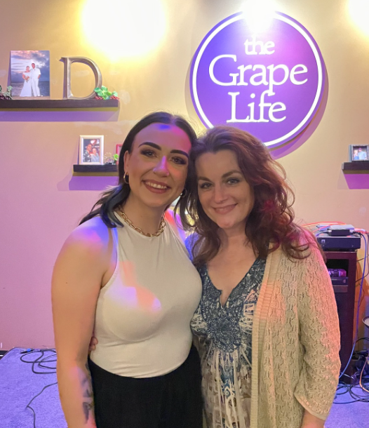 Tracey Tucker, right, and singer Josie Abigail at The Grape Life, Davenport, a favorite venue for Douglas & Tucker.