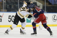Brendan Lemieux, right, of the New York Rangers, fights Nick Ritchie, left, of the Boston Bruins during the third period of an NHL game at Madison Square Garden Sunday, Feb. 28, 2021, in New York. (Sarah Stier/Pool Photo via AP)