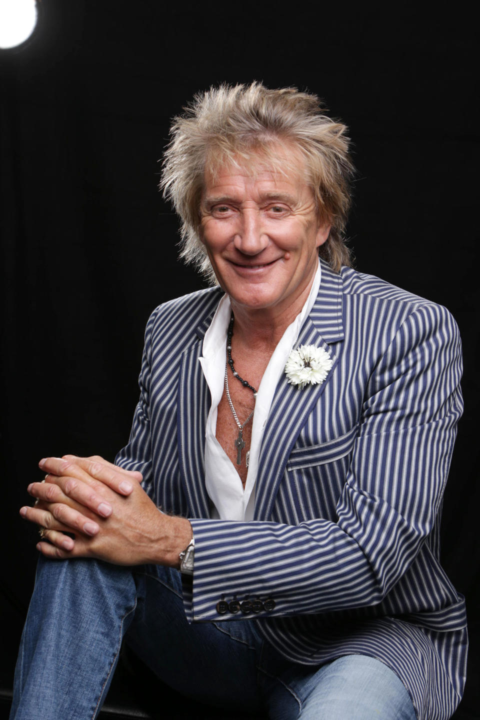 In this Thursday, May 2, 2013 photo, singer Rod Stewart poses for a portrait in Los Angeles. His new album, "Time," is out on Tuesday, May 7. (Photo by Eric Charbonneau/Invision/AP)