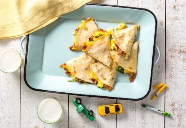 <p>Try this delicious breakfast quesadilla recipe and you won't be sorry. For a vegetarian version, substitute ¼ cup canned black beans, drained, rinsed and lightly mashed, for the <a href="https://parade.com/1105169/parade/bacon-recipes/" rel="nofollow noopener" target="_blank" data-ylk="slk:bacon;elm:context_link;itc:0;sec:content-canvas" class="link ">bacon</a>.</p><p><strong>Get the recipe: </strong><em><strong><a href="https://parade.com/841777/communitytable/breakfast-quesadilla/" rel="nofollow noopener" target="_blank" data-ylk="slk:Bacon-Spinach Breakfast Quesadilla;elm:context_link;itc:0;sec:content-canvas" class="link ">Bacon-Spinach Breakfast Quesadilla</a></strong></em></p><p><strong>Related: <a href="https://parade.com/295842/smccook/how-to-grill-quesadillas-in-foil-packets/" rel="nofollow noopener" target="_blank" data-ylk="slk:The Secret to Making 5-Minute Quesadillas on the Grill;elm:context_link;itc:0;sec:content-canvas" class="link ">The Secret to Making 5-Minute Quesadillas on the Grill</a></strong></p><p>Mark Boughton Photography / Styling by Teresa Blackburn</p>