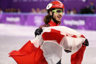 <p>Shaggy haired Canadian speed skater Samuel Girard won a gold medal in short track speed skating. And he did it while looking good, thanks to his hipster folk-singer style chin fuzz. (Getty) </p>