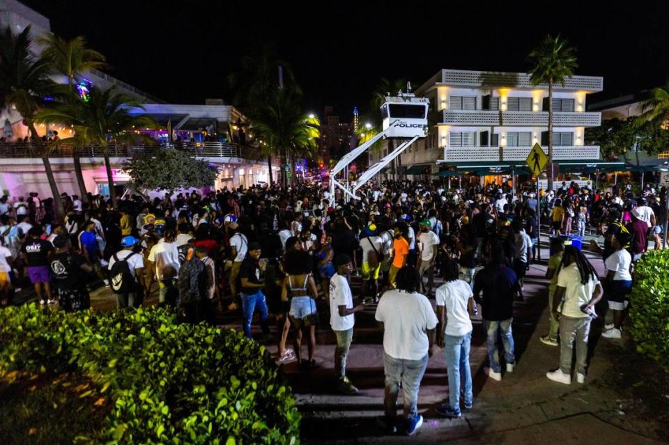 Crowds gather at Ocean Drive and 8th Street during Spring Break in Miami Beach, Florida, on Saturday, March 18, 2023.