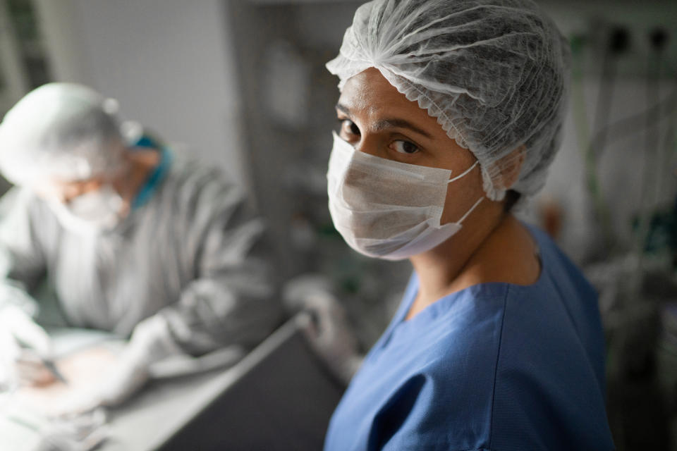 Portrait of female healthcare worker on operating room at hospital