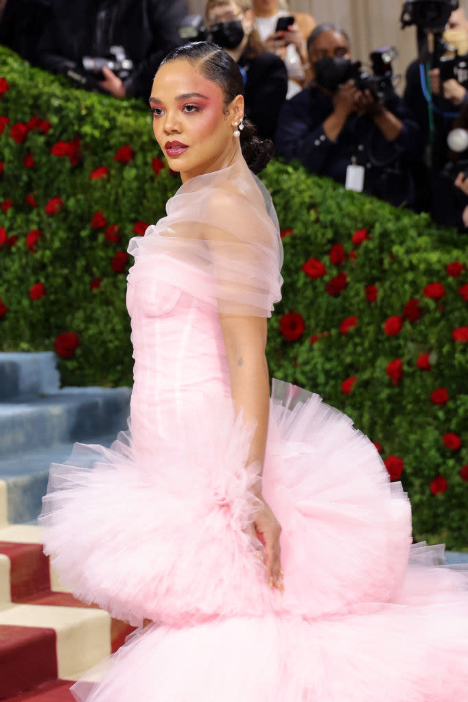 A closeup of Tessa Thompson on the red carpet