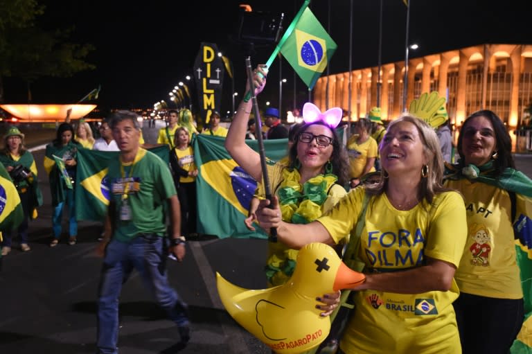 A group of citizens opposing Brazilian President Dilma Rousseff rally in front of the National Congress in Brasilia