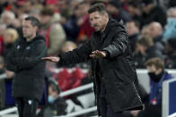 Atletico Madrid's head coach Diego Simeone gestures during the Champions League group B soccer match between Liverpool and Atletico Madrid in Liverpool, England, Wednesday, Nov. 3, 2021.(AP Photo/Jon Super)