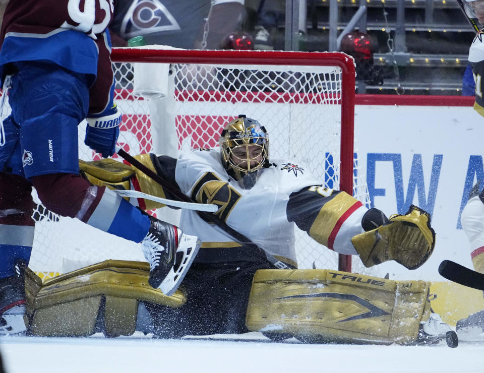 Vegas Golden Knights goaltender Marc-Andre Fleury (29) makes a save against the Colorado Avalanche during the first period in Game 2 of an NHL hockey Stanley Cup second-round playoff series Wednesday, June 2, 2021, in Denver. (AP Photo/Jack Dempsey)