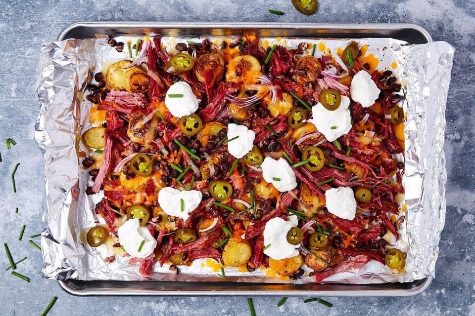 <p>Like green beer and corned beef and cabbage, these nachos are about as American as they come — and about as delicious, too. </p><p>Get the <strong><a href="https://www.delish.com/cooking/recipe-ideas/a35822404/st-patricks-day-nachos-recipe/" rel="nofollow noopener" target="_blank" data-ylk="slk:St. Patrick's Day Nachos recipe;elm:context_link;itc:0;sec:content-canvas" class="link ">St. Patrick's Day Nachos recipe</a> </strong>from Delish. </p>