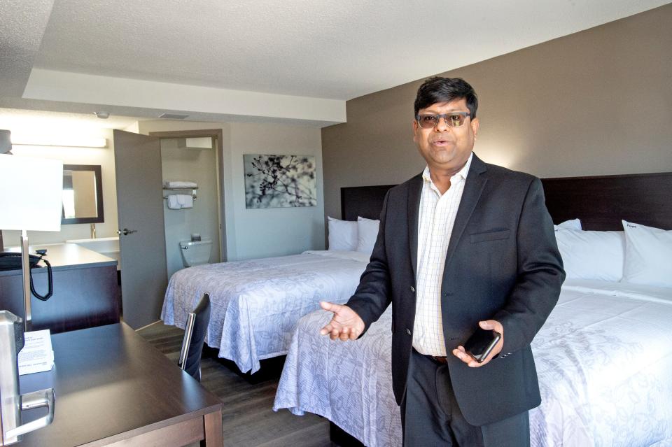 Sanjay Bharitya, one of the owners of the newly rebuilt Red Roof Plus & Suites, shows one of the newly renovated rooms, on May 19, 2022, at the site of the former Holiday Inn in Erie. Future Governor Tom Ridge frequented the former Holiday Inn, which fell into disrepair and was forced to close a couple of years ago.