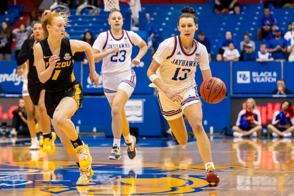 Kansas guard Holly Kersgieter (13) drives the ball up court during the second round of the Women’s NIT game between the Kansas Jayhawks and Missouri Tigers on Saturday March 20, 2023 at Allen Field house in Lawrence, Kansas.