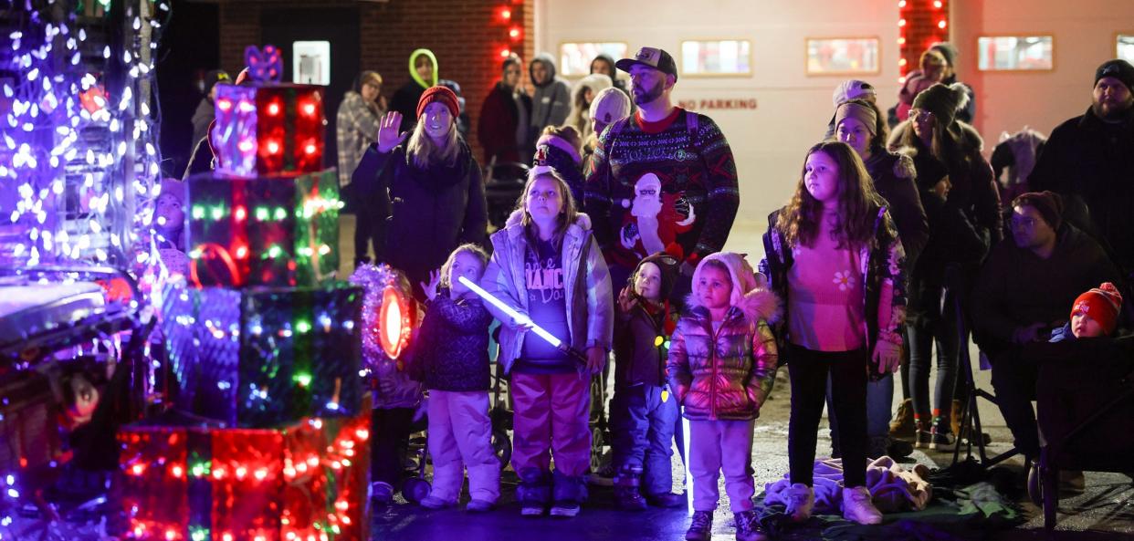 Families gathered to watch a variety of floats and lighted units in the Parade of Lights at this year's 41st Christmas in Ida Festival, held Dec. 1-2.