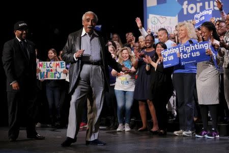 Congressman Charles Rangel dances as he awaits the start of a campaign rally for U.S. Democratic presidential candidate Hillary Clinton (unseen) at the Apollo Theater in Harlem, New York March 30, 2016. REUTERS/Lucas Jackson