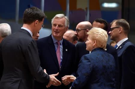 European Chief Negotiator for Brexit Michel Barnier chats with Netherlands' Prime Minister Mark Rutte and Lithuania's President Dalia Grybauskaite during a EU summit in Brussels, Belgium April 29, 2017. Reuters/Eric Vidal