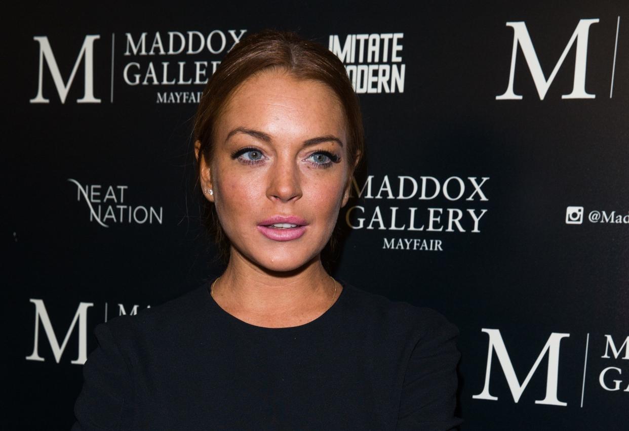 Lindsay Lohan urged her Twitter followers to "start trusting" Donald Trump. (Photo: Luca Teuchmann via Getty Images)