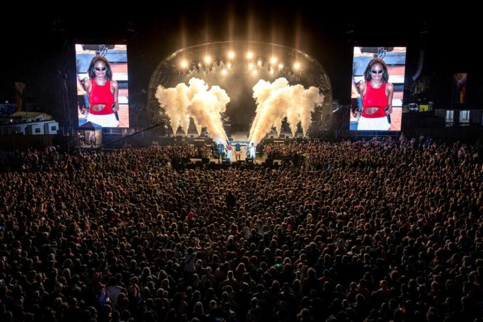 Brighton Pride mainstage showing a massive crowd in front of it