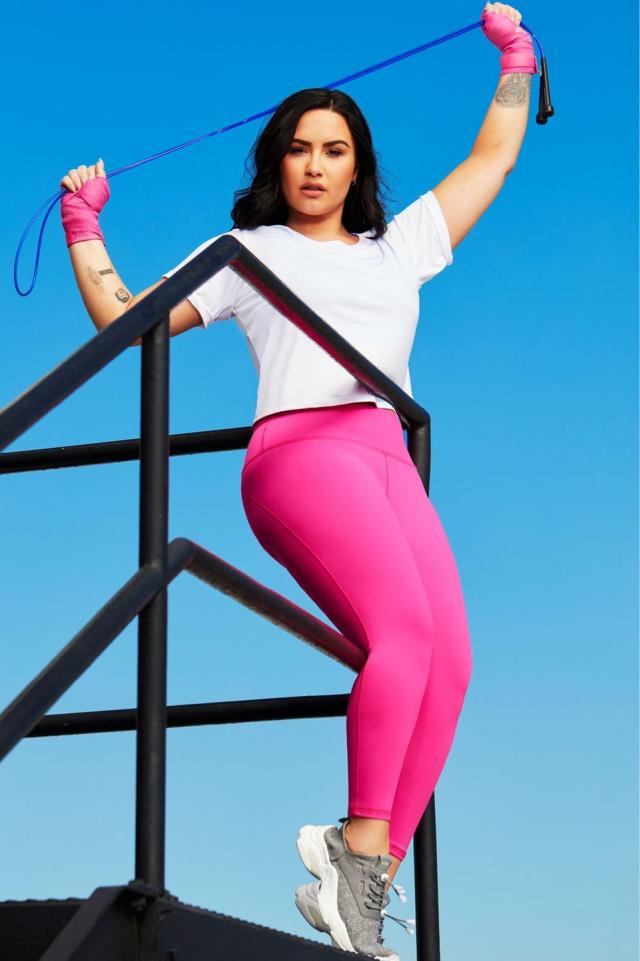 Demi Lovato for Fabletics blue sports bra and leggings