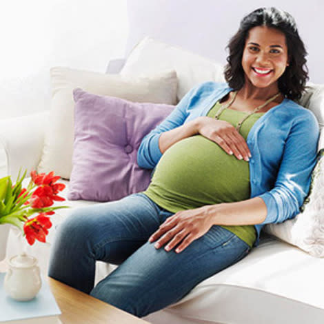 Pregnant Woman on Couch