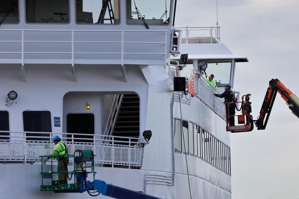 In this file photo, workmen are seen performing annual maintenance on the M/V Nantucket ferry, docked at the Steamship Authority maintenance facility on Main Street in Fairhaven.