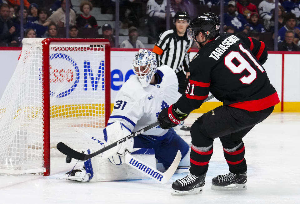 Ottawa Senators right wing Vladimir Tarasenko (91) scores against Toronto Maple Leafs goaltender Martin Jones (31) during second-period NHL hockey game action in Ottawa, Ontario, Saturday, Feb. 10, 2024. (Sean Kilpatrick/The Canadian Press via AP)