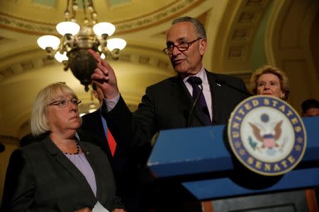 Senate Minority Leader Chuck Schumer, accompanied by Senator Patty Murray (D-WA) and Senator Debbie Stabenow (D-MI), speaks with reporters following the successful vote to open debate on a health care bill on Capitol Hill in Washington, U.S., July 25, 2017. REUTERS/Aaron P. Bernstein