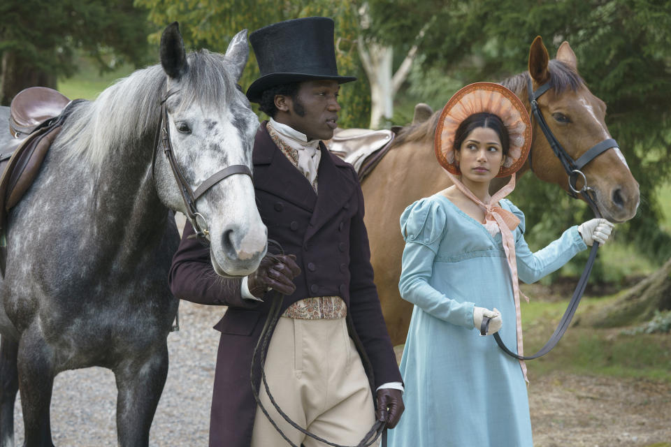 This image released by Bleecker Street shows Ṣọpẹ́ Dìrísù, left, and Freida Pinto in a scene from "Mr. Malcolm's List." (Ross Ferguson/Bleecker Street via AP)