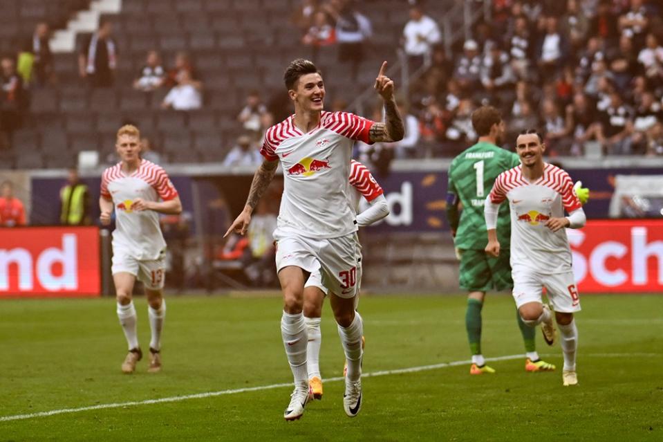 Leipzig's Benjamin Sesko celebrates scoring the second goal during the German first division Bundesliga football match between Eintracht Frankfurt and RB Leipzig in Frankfurt am Main, western Germany on May 18, 2024. (Photo by KIRILL KUDRYAVTSEV/AFP via Getty Images)