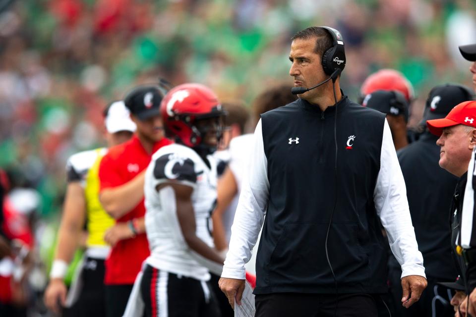 Cincinnati Bearcats head coach Luke Fickell looks on in the first half of the NCAA football game between the Cincinnati Bearcats and the <a class="link " href="https://sports.yahoo.com/ncaaw/teams/notre-dame/" data-i13n="sec:content-canvas;subsec:anchor_text;elm:context_link" data-ylk="slk:Notre Dame Fighting Irish;sec:content-canvas;subsec:anchor_text;elm:context_link;itc:0">Notre Dame Fighting Irish</a> on Saturday, Oct. 2, 2021, at Notre Dame Stadium in South Bend, Ind.