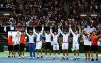 Tennis - Croatia v France - Davis Cup World Group Semi Final - Kresimir Cosic Hall, Zadar, Croatia - 18/9/16 Croatia's tennis team celebrate after winning a match against France's. REUTERS/Antonio Bronic