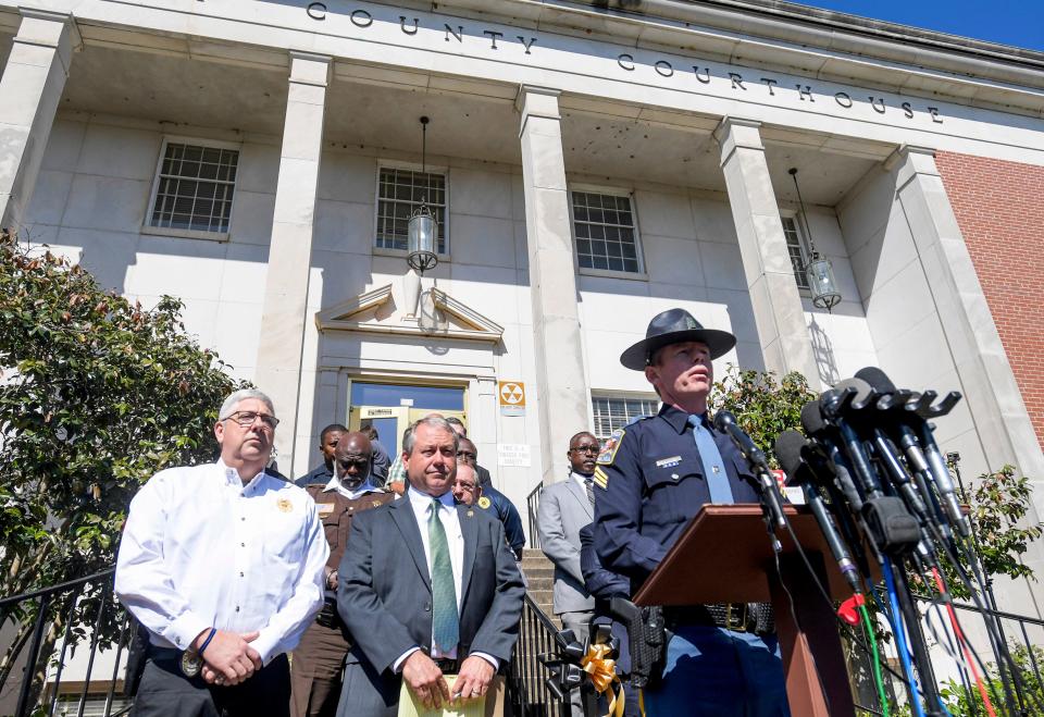 Alabama Law Enforcement Agency Sgt. Jeremy Burkett, right, District Attorney Mike Segrest, center, and Dadeville Police Chief Jonathan Floyd, left, speak on Wednesday April 19, 2023, during a joint press conference on the fatal shooting in Dadeville, Ala.